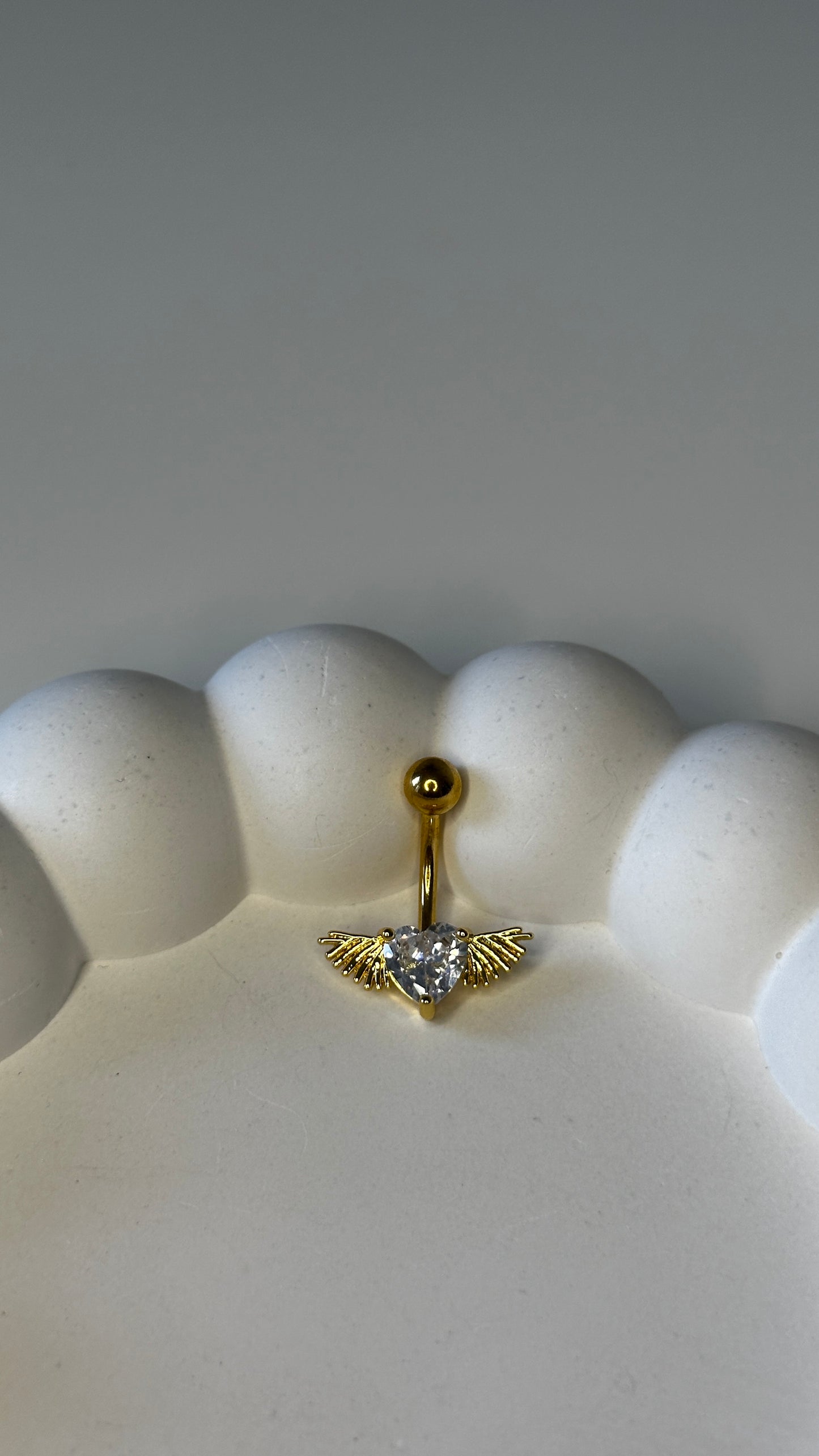 Bauchnabelpiercing ‚Flying Heart‘