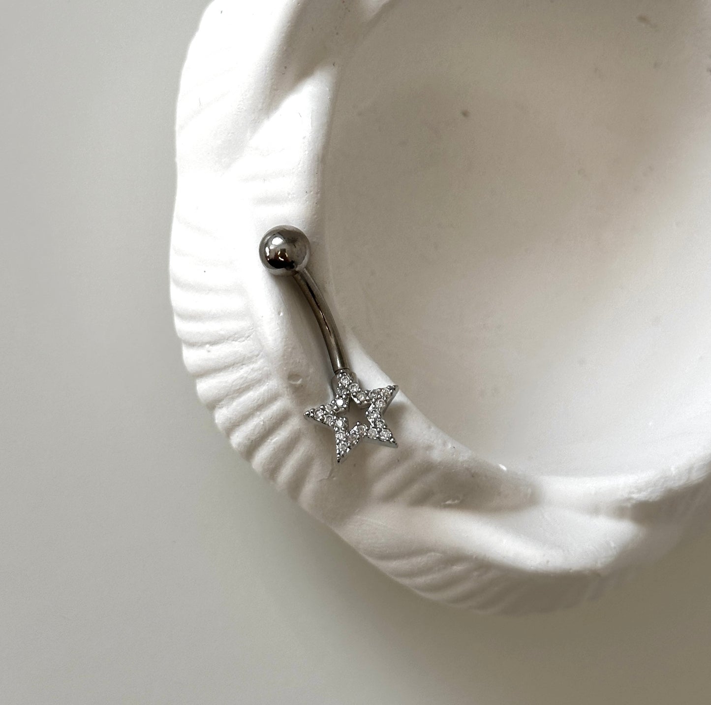 Bauchnabelpiercing ‚Sparkling Star‘ in Silber