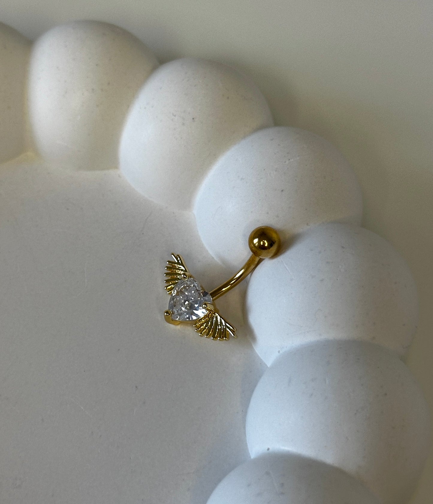 Bauchnabelpiercing ‚Flying Heart‘
