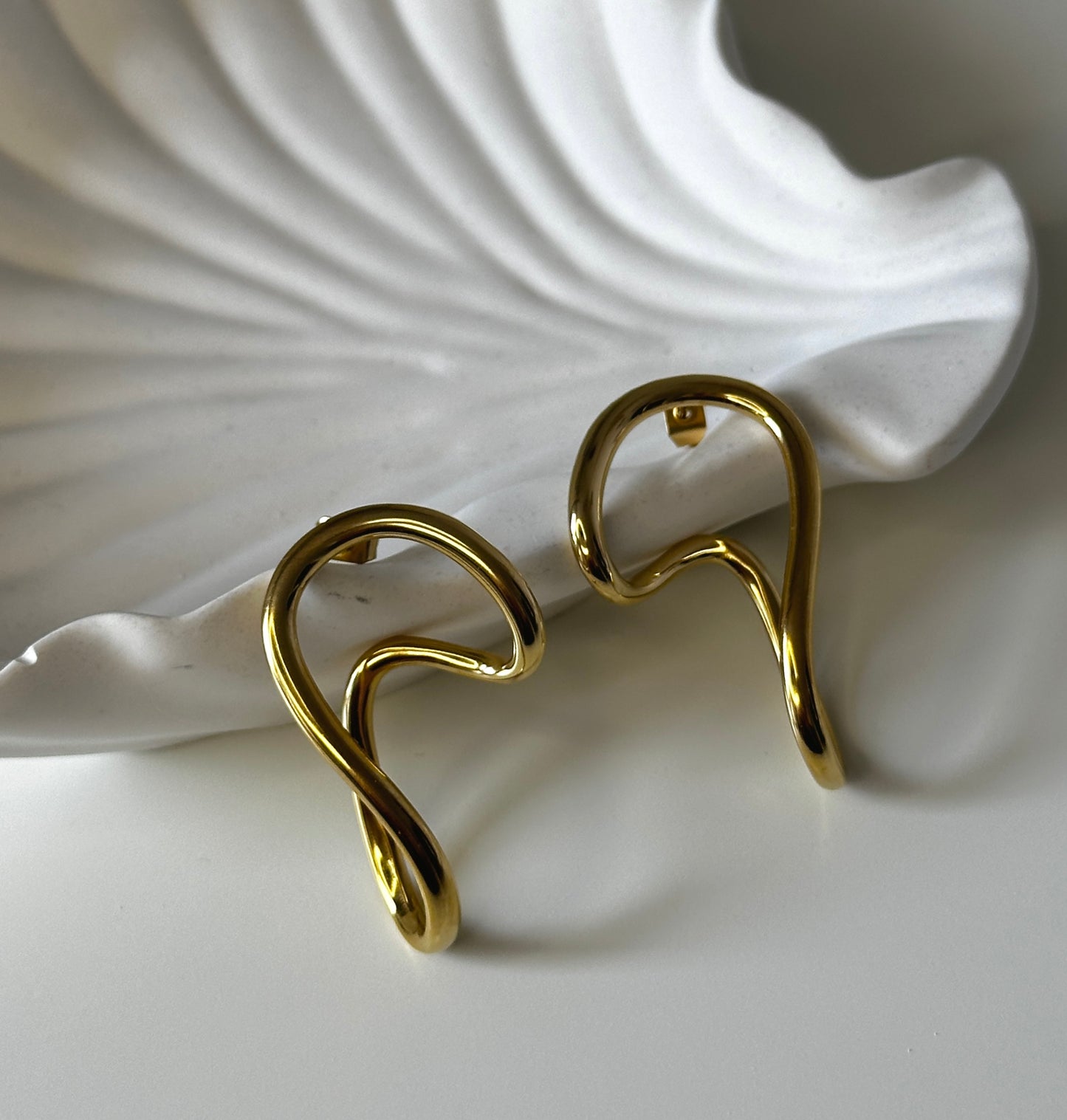 Ohrringe ‚Swirl Symphony‘ in Gold