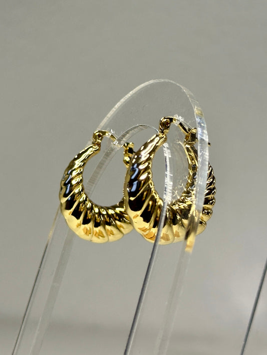 Ohrringe ‚Shell‘ in Gold