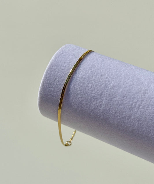 Armband ‚Herringbone’ in Gold schmal